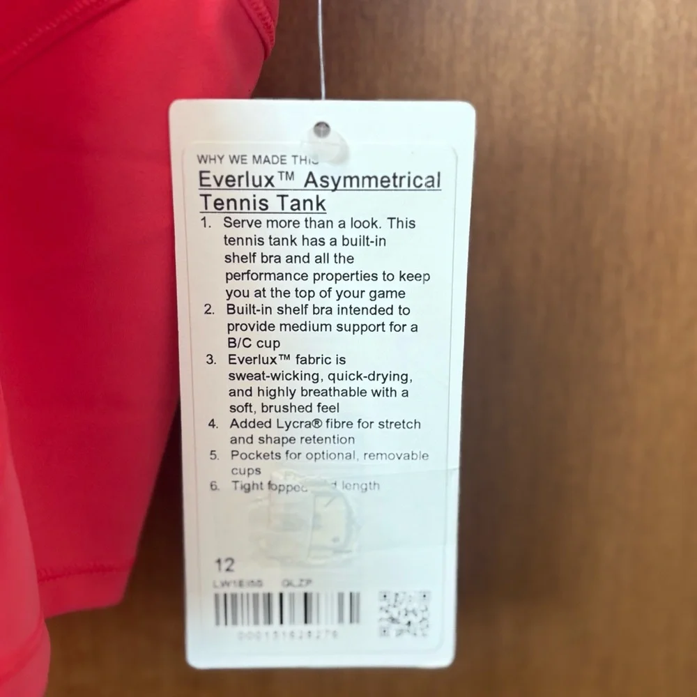 Lululemon Everlux Asymmetrical Tennis
Tank Top. NWT. Sz 12. Color Glazed Pink. - Picture 6 of 6